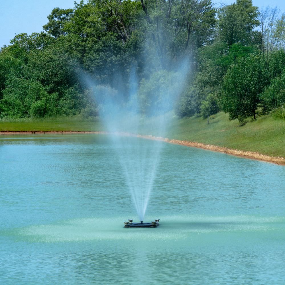 Outdoor Water Solutions Palatial Display Solar Pond Fountain With Neutron Spray Pattern On The Water