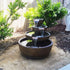 Thumbnail for Piatti Fountain With Plants And Wooden Fence In The Background