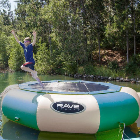 Rave Sports Aqua Jump Water Trampoline With A Boy Jumping