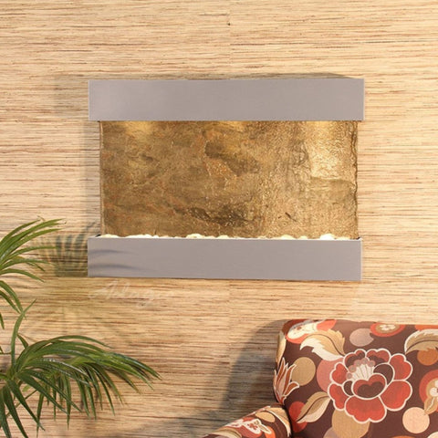 Reflection Creek Wall Mounted Fountain Hanged on Textured Wall and Colorful Print 