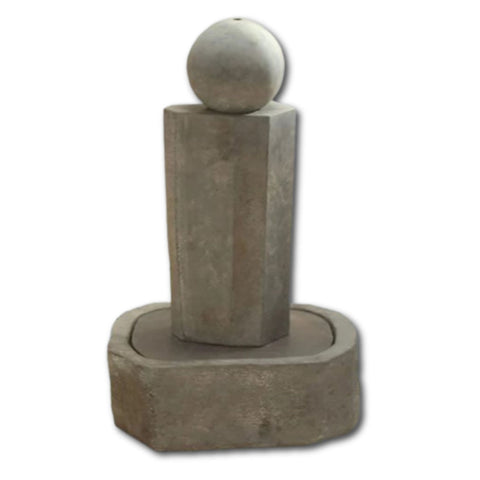 Rock Pillar Fountain Short With Ball With Plain White Background