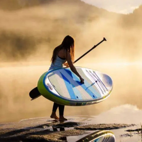 SUP Spinera Sun Light 11 0 A Woman Is About to Put Down What She is Carrying