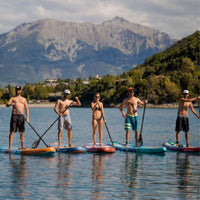 Thumbnail for SUP Sunset 10.6 A Group Paddling Together with Mountain Background