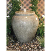 Santa Barbara Urn Garden Fountain with 2inch Reservoir Surrounded By Greenery With Lattice Screen And Climbing Vines