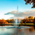 Thumbnail for Scott Aerator Atriarch Pond Fountain On The Water With Colorful Trees In The Background