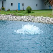 Scott Aerator Boilermaker Aerator On The Water With A Building In The Background