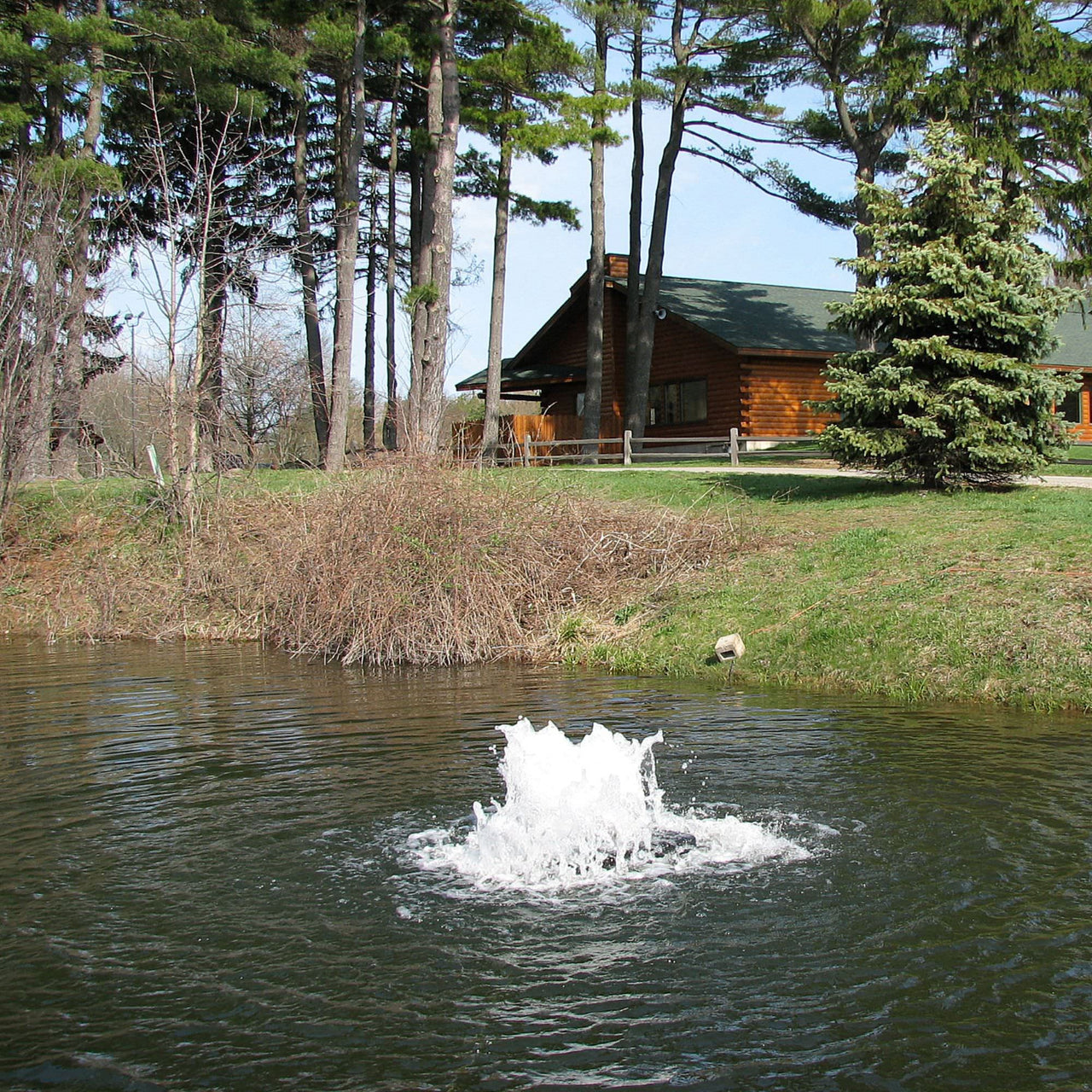 Scott Aerator Boilermaker Pond Aerator On The Water With Green Trees In tThe Background