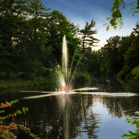 Scott Aerator Clover Pond Fountain On The Water With White Lights