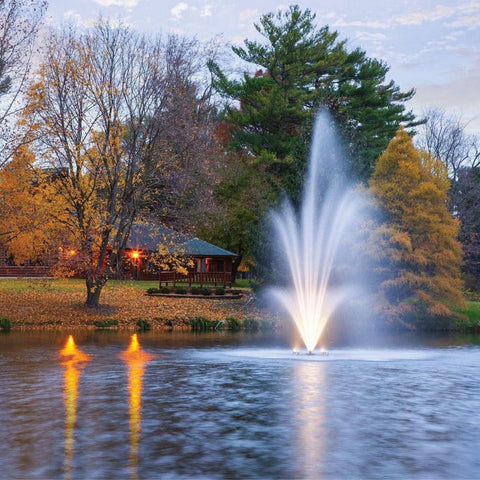Scott Aerator Amherst Pond Fountain With Lights On The Water With Colorful Trees In The Background