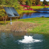 Scott Aerator Boilermaker Solar Pond Aerator On The Water With 2 Panels & A Bridge In The Background