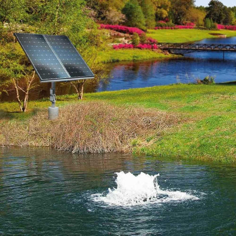 Scott Aerator Boilermaker Solar Pond Aerator On The Water With 2 Panels & A Bridge In The Background