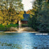 Scott Aerator Great Lakes Nozzle Package Baystone Pattern Display With Colorful Trees And A House In The Background