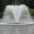 Thumbnail for Scott Aerator North Star Pond Aerator Fountain On The Water With Green Trees In The Background