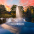 Thumbnail for Scott Aerator Triad Pond Fountain With Skyward Nozzle On The Water With Trees In The Background