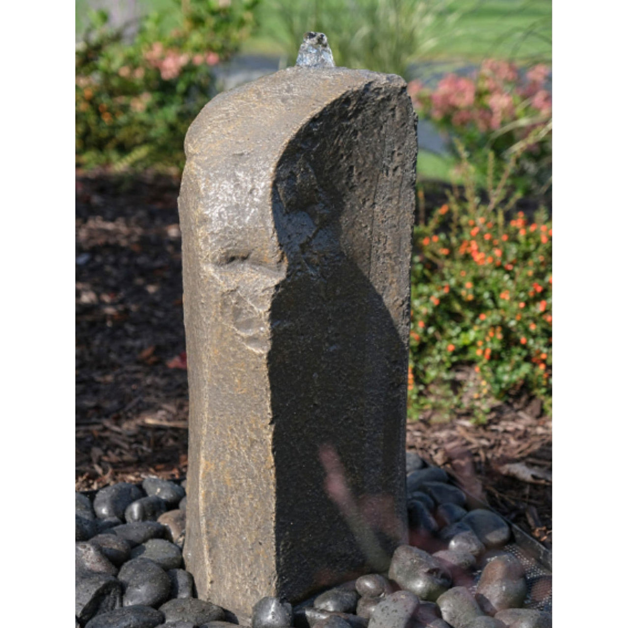 Silver Falls Outdoor Fountain Rock With Ornamental Flowers Backdrop