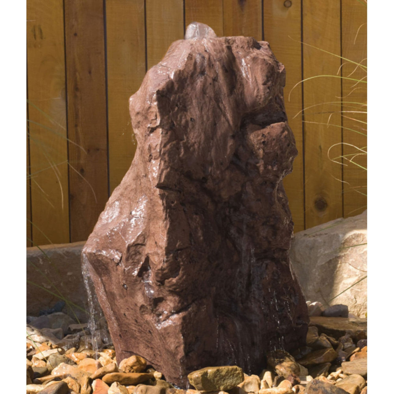 Sonoma Rock Outdoor Fountain With Wooden Wall Background And Beside The Big Rock