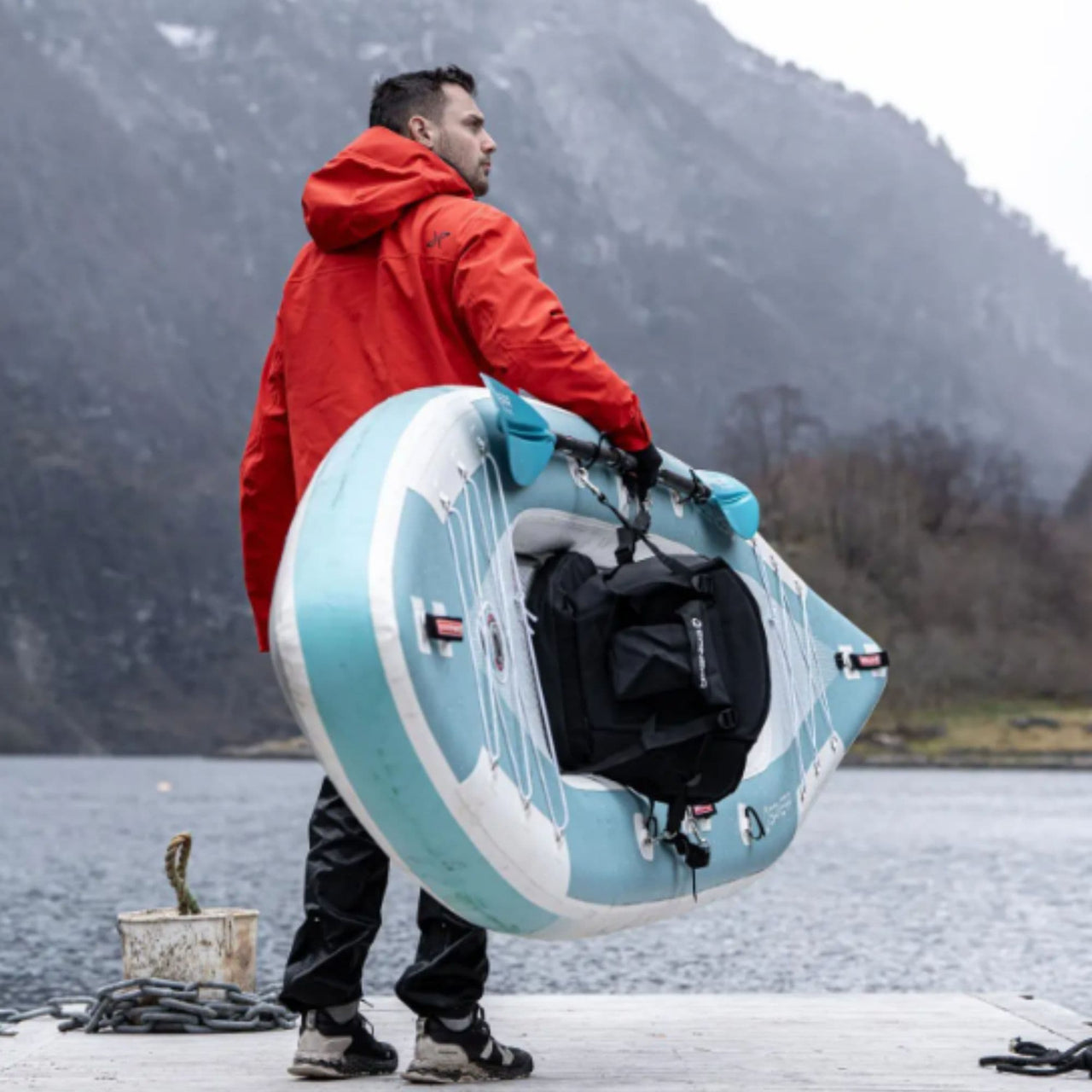 Spinera Adriatic 430 Inflatable Kayak With A Man Carrying Kayak By Mountain Lake