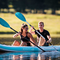 Thumbnail for Spinera Adriatic 430 Light Inflatable Kayak With A Couple Enjoying Kayaking On Tranquil Lake
