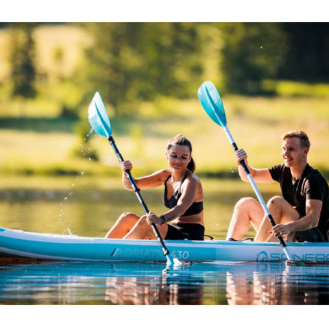 Spinera Adriatic 430 Light Inflatable Kayak With A Couple Kayaking On Calm Forest Lake