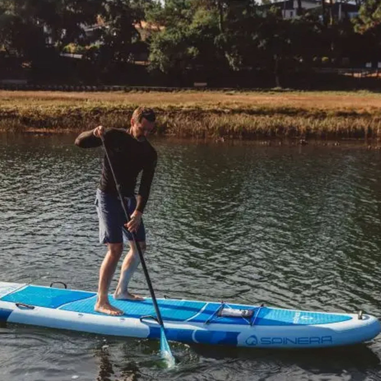 Spinera Family 13.0 Paddle Board Man Paddling On Calm Lake Water