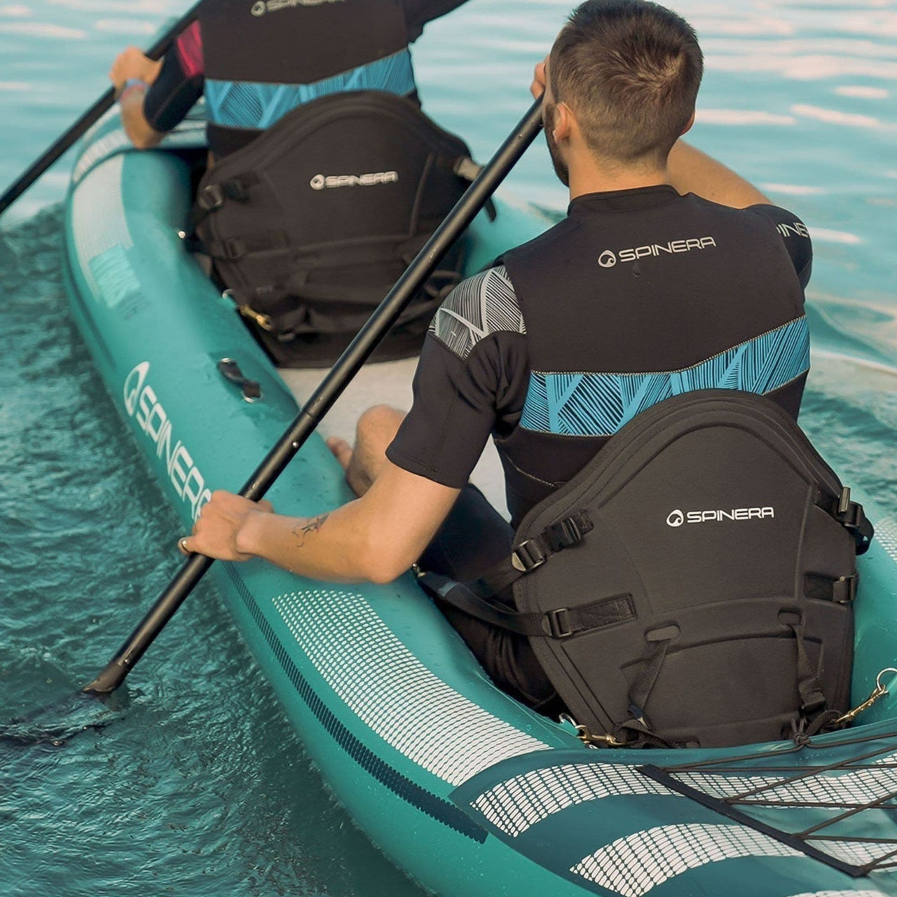 Spinera Hybris 410 Inflatable Kayak With Two Men Paddling On Blue Water