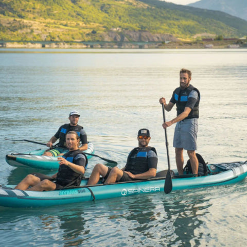 Spinera Hybris 500 With A Group Of Four Kayaking On Calm Lake