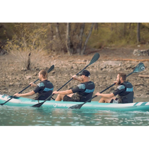 Spinera Hybris 500 With Three Riders Kayaking And Paddling Together On Calm Waters