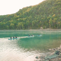 Thumbnail for Spinera Kayak Hybris 500 With A Group Kayaking On Calm Water With Green Mountain View