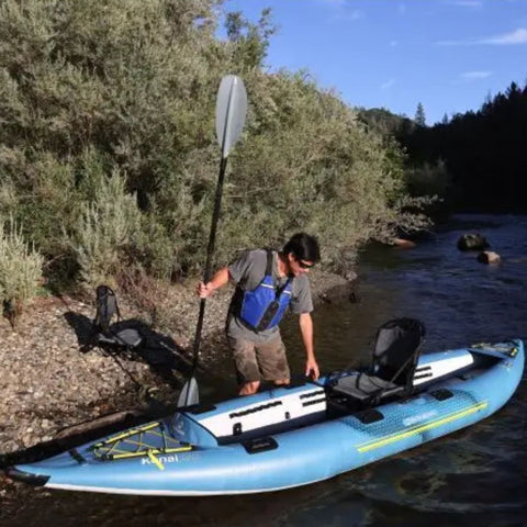 Spinera Kenai 130 Inflatable Kayak With A Man Getting Reading For Kayaking Holding A Paddle On River