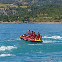 Thumbnail for Spinera Lets Go 4 Person Towable With Four Friends Riding And Mountain All Around