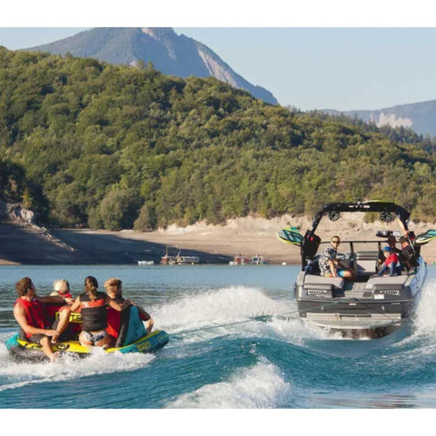 Spinera Lets Go Family 4 Towable With Four Friends Riding and Nature All Around