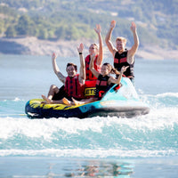 Thumbnail for Spinera Lets Go Family 4 Towable With Four People Waving Riding The Wake