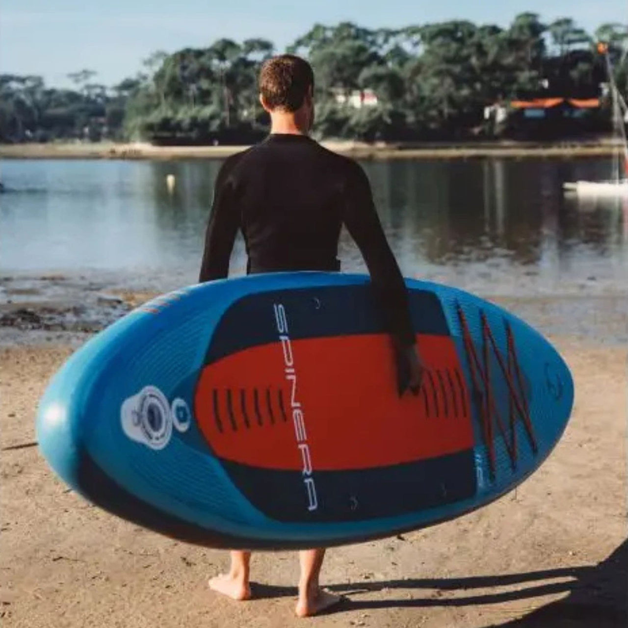 Spinera Lets Paddle 11 6 Paddle Board With A Man Carrying a Boards on Lake