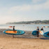 Thumbnail for Spinera Lets Paddle 12.4 Paddle Board With Three People Carrying Boards by Shore