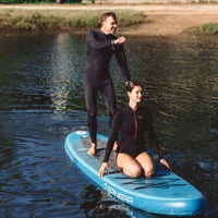 Thumbnail for Spinera Lets Paddle 12.4 Paddle Board With a Man Paddling and a Girl Sitting Near Lake Shore