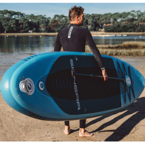 Spinera Lets Paddle 12.4 With a Man Facing Away Carrying on His Right Hand