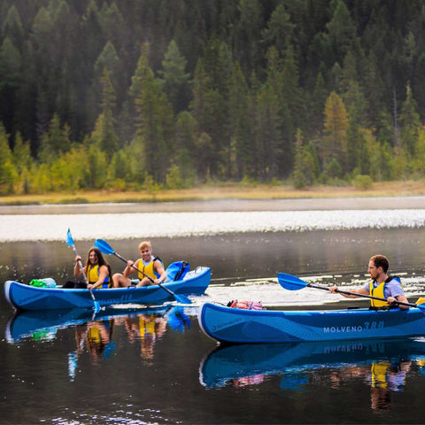 Spinera Molveno 410 Inflatable Kayak With A Group Kayaking Calmly On Scenic Lake