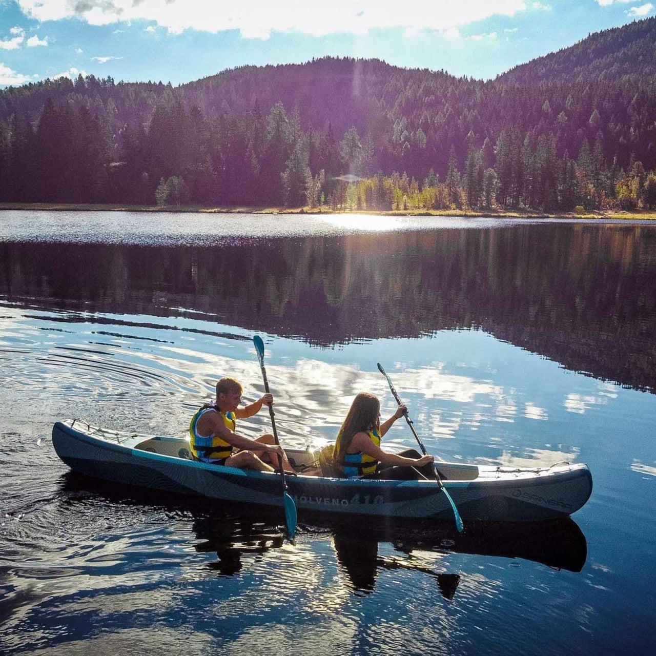 Spinera Molveno 410 With A Couple Paddling Calmly On A Mountainous Lake