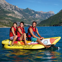Thumbnail for Spinera Rocket 3 Person Towable With Three People Ready For A Ride and Looking To The Right