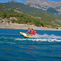 Thumbnail for Spinera Rocket 3 Person Towable With Three People Riding and Mountains Behind
