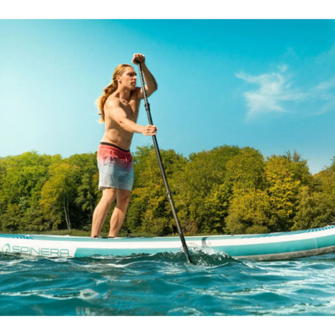 Spinera SK12_Kayak With a Man Stand Up Paddling on Sunny Day