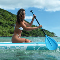 Thumbnail for Spinera SK12 With a Woman Paddling On Clear Blue Water