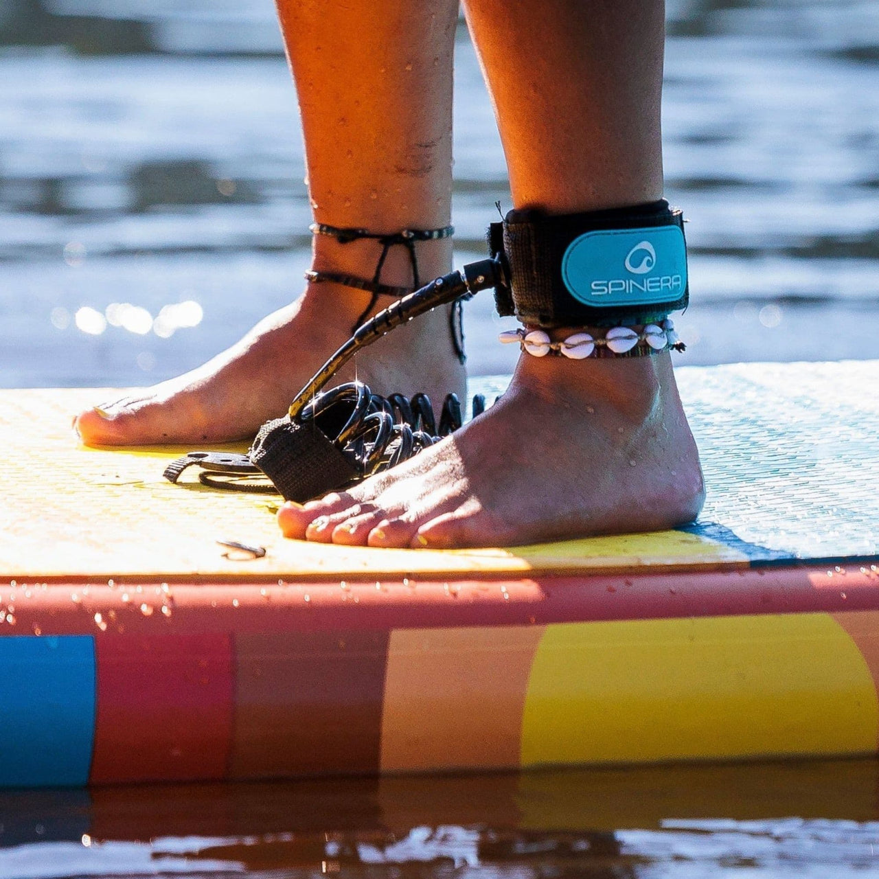 Spinera SUP Supventure Sunset 10.6 With a Close-up of an Ankle Leash