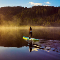 Thumbnail for Spinera Sun Light 11.0 Paddle Board With a Woman Gliding on Misty Lake
