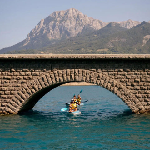 Spinera Tenaya 120 Inflatable Kayak With Three People Kayaking Together On Blue Water