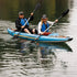 Thumbnail for Spinera Tenaya 140 Inflatable Kayak With a Man And Woman Kayaking And Paddling In Calm Waters