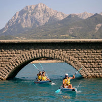 Thumbnail for Spinera Tenaya 140 With Three People Kayaking Together On Blue Water With Stone Bridge Background