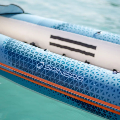 Spinera Tenaya 160 Inflatable Kayak Close-Up Patterned Kayak Resting On Water