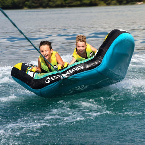 Spinera Wing 2 Person Towable With Kids Having Fun Tubing Over The Waves