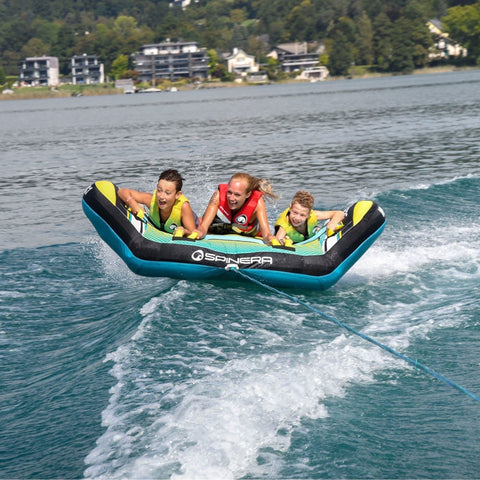 Spinera Wing 3-Person Towable With Three People Tubing Enjoying the Ride